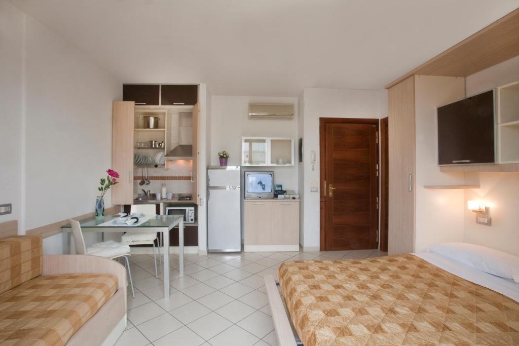 ריצ'יונה Residence Il Tulipano חדר תמונה
