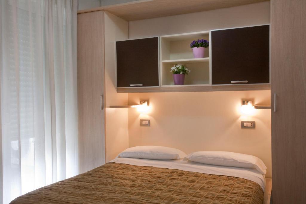 ריצ'יונה Residence Il Tulipano חדר תמונה